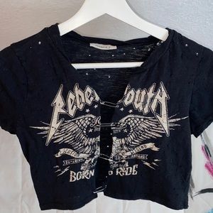 Punk distressed safety-pin crop top